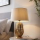 64719-001 Bright Gold Painted Floral Table Lamp with Ivory Shade