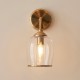 78811-001 Brushed Aged Brass Wall Lamp with Clear Glass