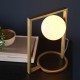 63766-100 Brushed Gold Table Lamp with White Glass